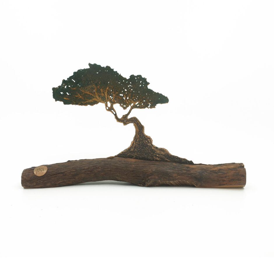 Árbol al viento